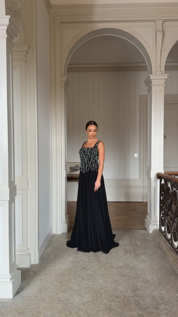 Robe de soirée élégante noir sans manche sans fente